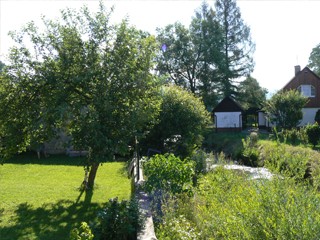 Part of the garden with a stream nearby